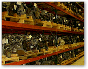 Engine blocks and other parts, racked and stored indoors to maintain quality